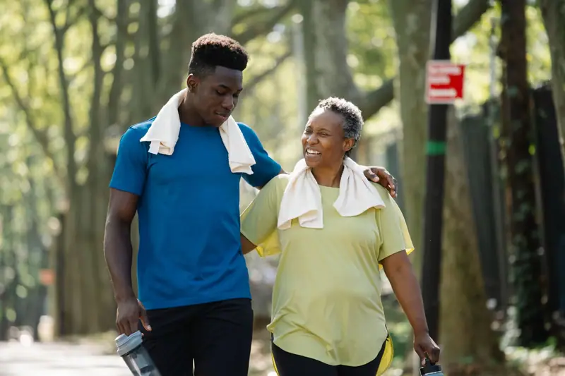 An older woman out for a walk with a younger companion